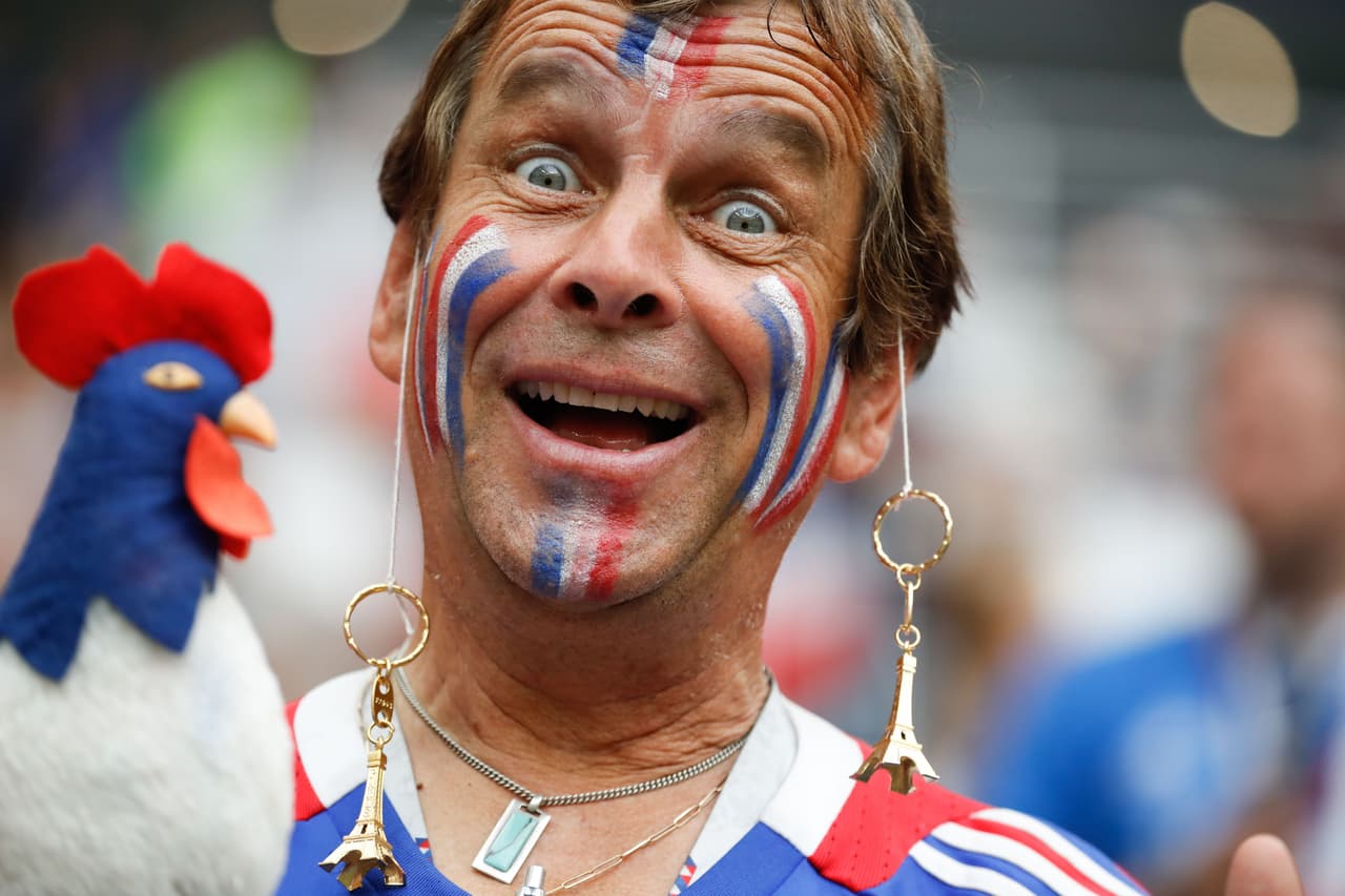 TOPSHOT - A France fan cheers prior to the Russia 2018 World Cup final football match between France and Croatia at the Luzhniki Stadium in Moscow on July 15, 2018. (Photo by Odd ANDERSEN / AFP) / RESTRICTED TO EDITORIAL USE - NO MOBILE PUSH ALERTS/DOWNLOADS (Photo credit should read ODD ANDERSEN/AFP/Getty Images)
