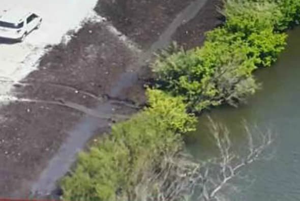 Encuentran cuerpo de una mujer al interior de un vehículo en una laguna camino a Bourbonnais