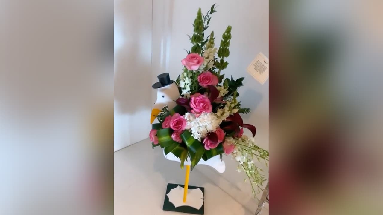 Este fue uno de los arreglos florales que más le gustó a Michelle. Venía con una tarjeta que auguraba mucha felicidad.