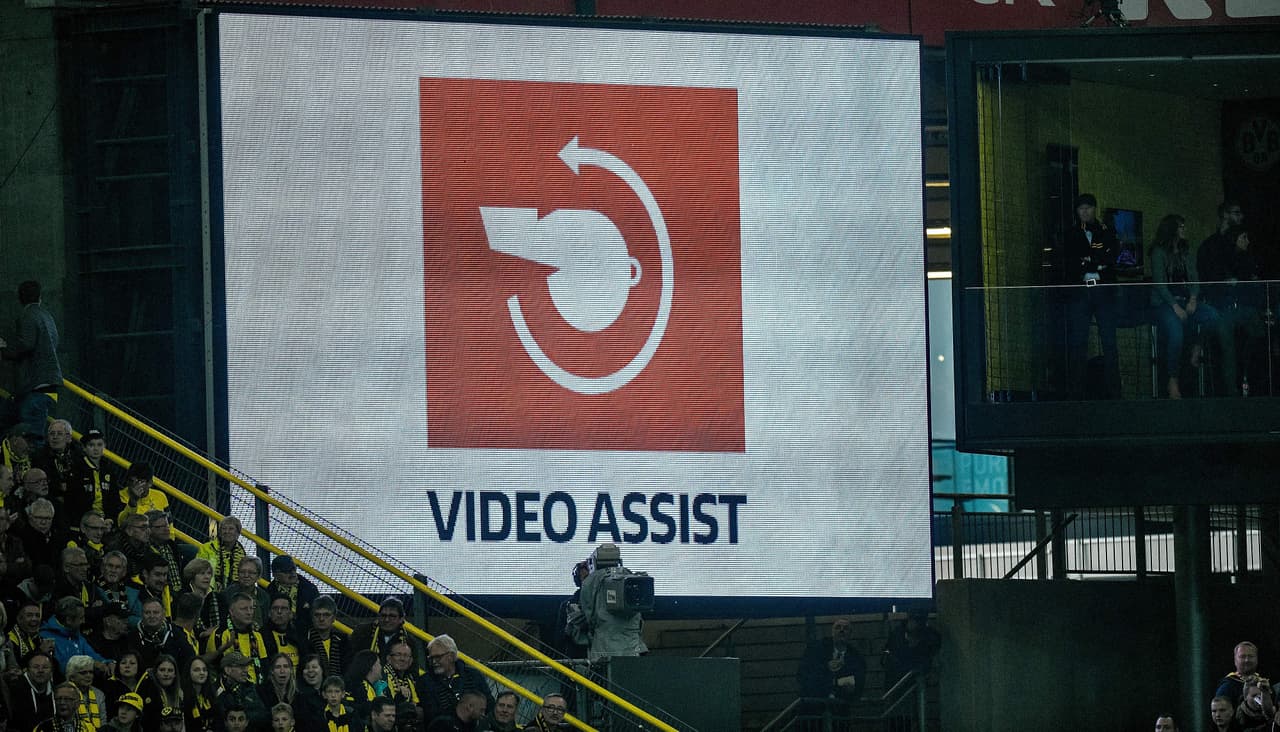 The logo of the video assistant referee (VAR) is dispayed on a screen during the German first division Bundesliga football match Borussia Dortmund v FC Cologne in Dortmund, western Germany, on September 17, 2017. / AFP PHOTO / SASCHA SCHUERMANN / RESTRICTIONS: DURING MATCH TIME: DFL RULES TO LIMIT THE ONLINE USAGE TO 15 PICTURES PER MATCH AND FORBID IMAGE SEQUENCES TO SIMULATE VIDEO. == RESTRICTED TO EDITORIAL USE == FOR FURTHER QUERIES PLEASE CONTACT DFL DIRECTLY AT + 49 69 650050 (Photo credit should read SASCHA SCHUERMANN/AFP/Getty Images)