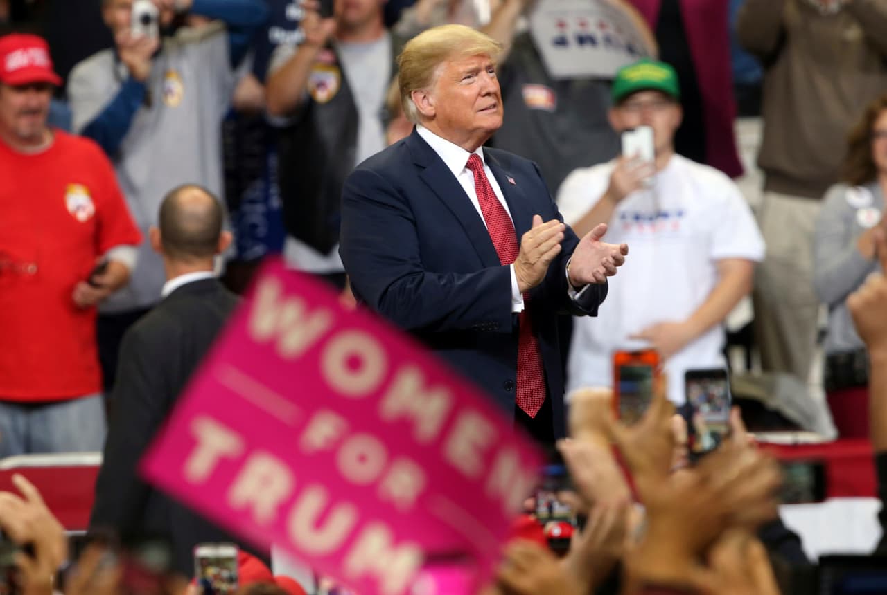 President Donald Trump arrives to speak at a campaign rally Thursday, Oct. 4, 2018, in Rochester, Minn. (AP Photo/Jim Mone)
