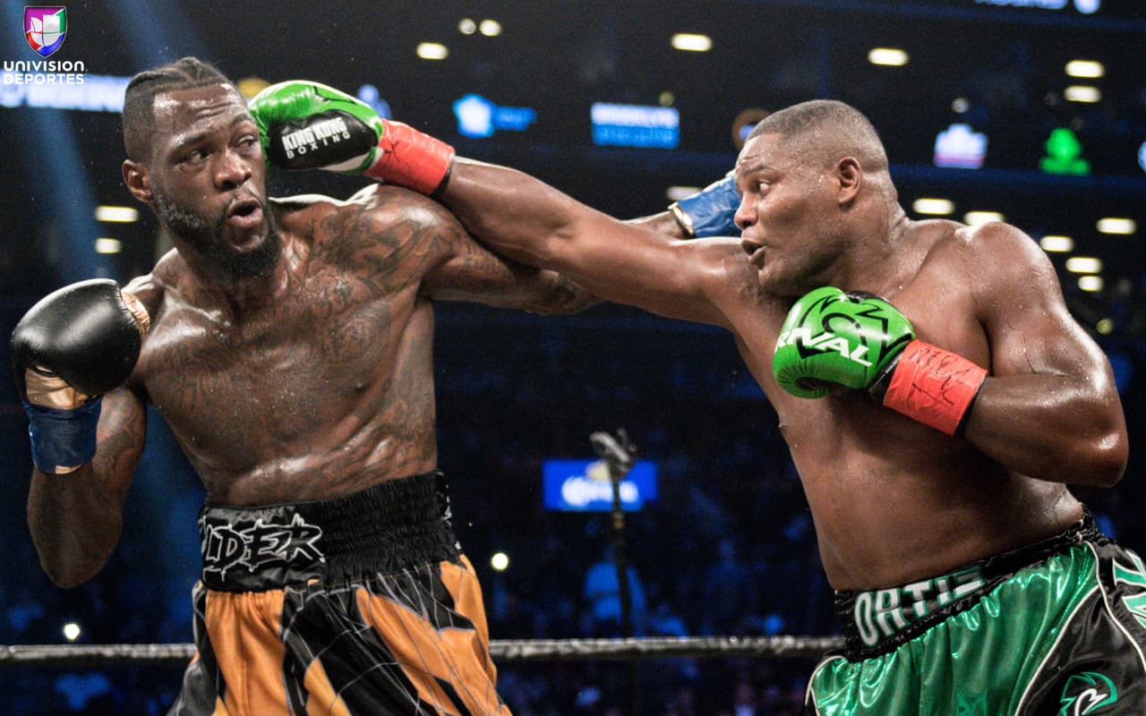 La pelea estelar en el Barclays Center de Brooklyn, una de las más esperadas en la categoría de los pesos completos, sobrepasó las expectativas de los aficionados. Luis Ortiz (28-1, 24 KOs) le complció la noche a Deontay Wilder (40-0, 39 KOs), pero el campeón sacó a relucir en el décimo round el poder que tiene en los nudillos para mandar al cubano a la lona en dos ocasiones y sellar la victoria.