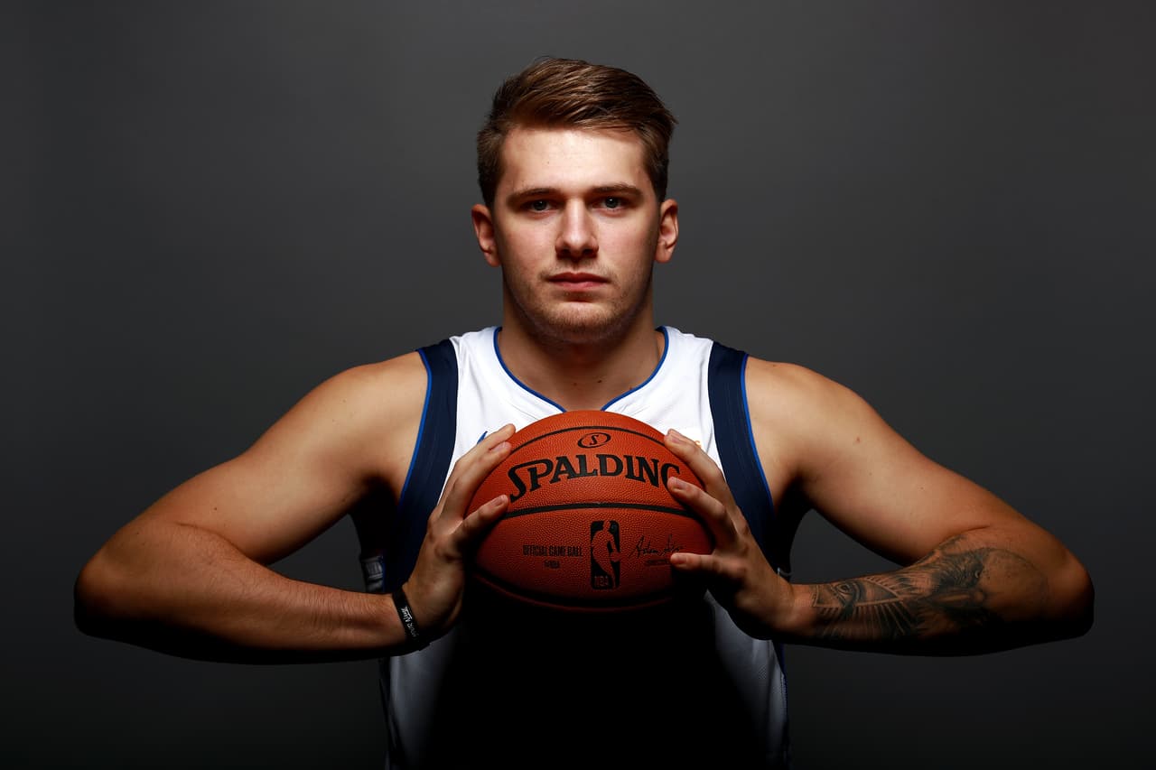 DALLAS, TX - SEPTEMBER 21: Luka Doncic #77 of the Dallas Mavericks poses for a portrait during the Dallas Mavericks Media Day held at American Airlines Center on September 21, 2018 in Dallas, Texas. NOTE TO USER: User expressly acknowledges and agrees that, by downloading and or using this photograph, User is consenting to the terms and conditions of the Getty Images License Agreement. (Photo by Tom Pennington/Getty Images)