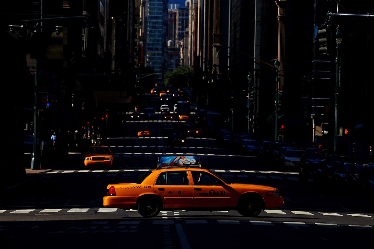 NEW YORK, NY - SEPTEMBER 09: A yellow taxi cab crosses a street in Midtown Manhattan on September 9, 2012 in New York City. (Photo by Dan Istitene/Getty Images)