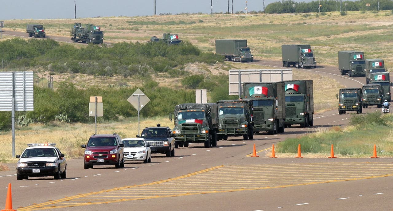 Texas Department of Public Safety troopers and U.S. Army personnel from Ft. Sam Houston in San Antonio, Texas, lead a convoy of Mexican vehicles along Texas Toll Road 255 west of Laredo, Texas Thursday, Sept. 8, 2005. The convey is headed to San Antonio to assist Hurricane Katrina refugees. The convoy is the first Mexican military unit to operate on U.S. soil since 1846.(AP Photo/Laredo Morning Times/Ricardo Santos)
