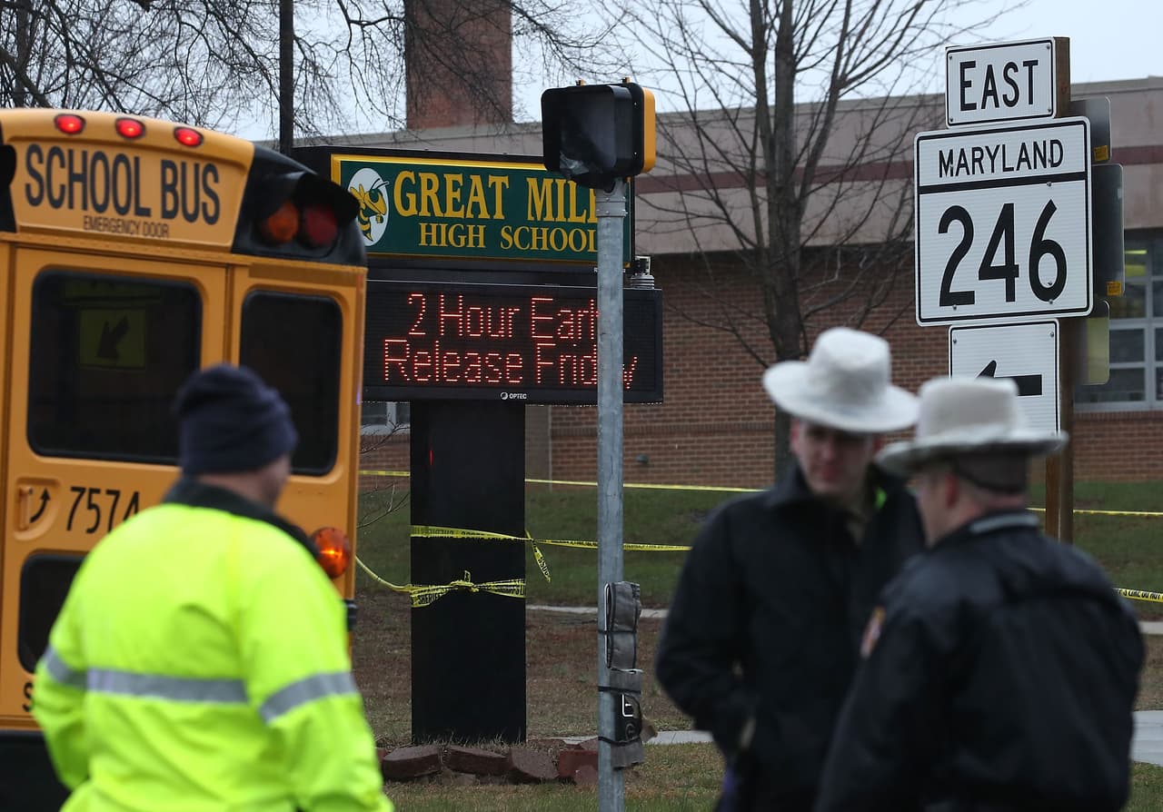 GREAT MILLS, MD - MARCH 20: Police stand in front of Great Mills High School after a shooting on March 20, 2018 in Great Mills, Maryland. It was reported that two students at a Maryland high school were injured after a colleague opened fire in the hallway just before classes began. (Photo by Mark Wilson/Getty Images)