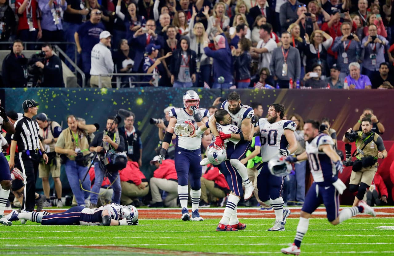 HOUSTON, TX - FEBRUARY 05: Tom Brady #12 of the New England Patriots reacts after defeating the Atlanta Falcons 34-28 in overtime to win Super Bowl 51 at NRG Stadium on February 5, 2017 in Houston, Texas. (Photo by Jamie Squire/Getty Images)