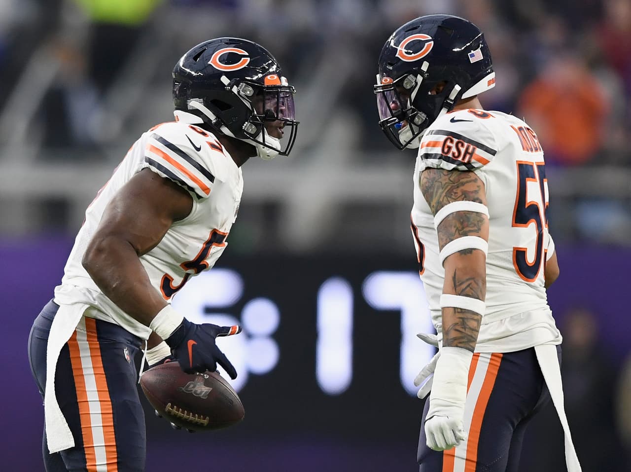 MINNEAPOLIS, MINNESOTA - DECEMBER 29: Kevin Pierre-Louis #57 of the Chicago Bears celebrates with teammate Josh Woods #55 after Pierre-Louis intercepted a pass by the Minnesota Vikings during the first quarter of the game at U.S. Bank Stadium on December 29, 2019 in Minneapolis, Minnesota. (Photo by Hannah Foslien/Getty Images)