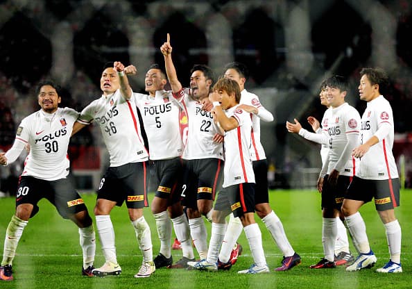 KASHIMA, JAPAN - NOVEMBER 29: (CHINA OUT, SOUTH KOREA OUT) Yuki Abe (4th L) of Urawa Red Diamonds celebrates scoring his team's first goal with his team mates during the J.League Championship Final first leg match between Kashima Antlers and Urawa Red Diamonds at Kashima Soccer Stadium on November 29, 2016 in Kashima, Ibaraki, Japan. (Photo by The Asahi Shimbun via Getty Images)