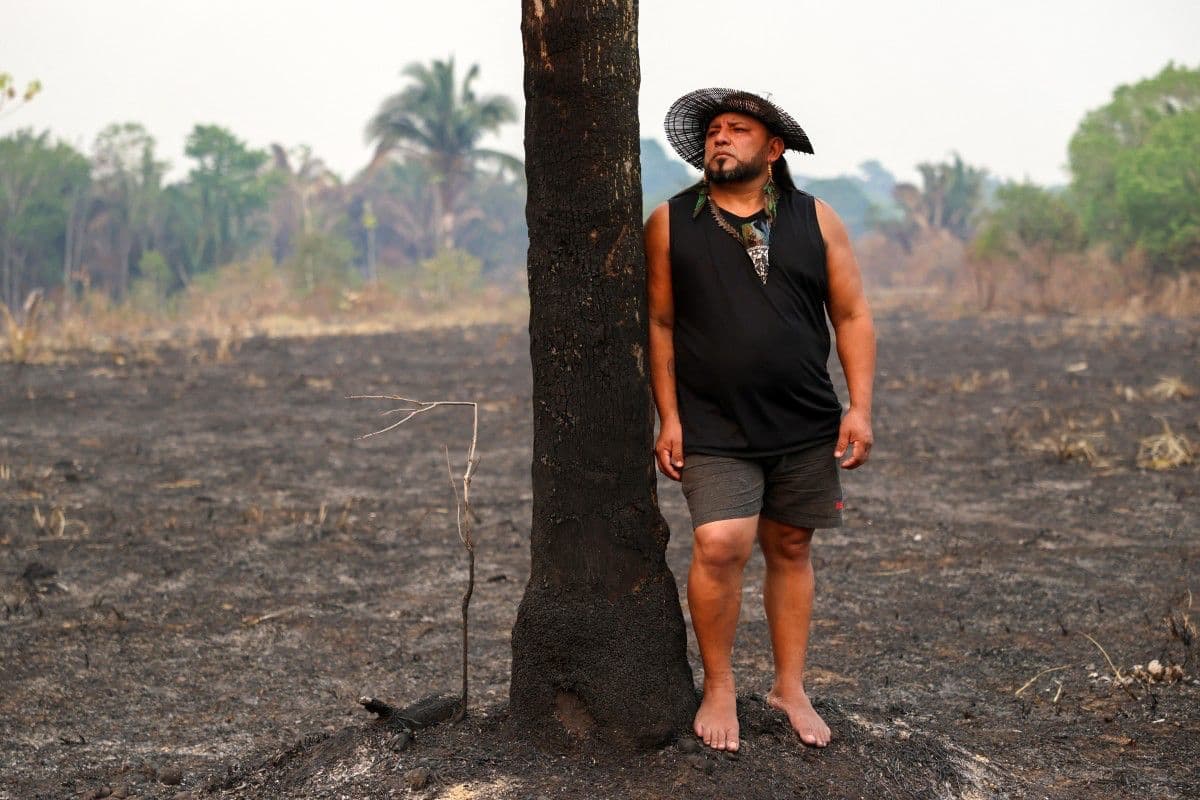 Tuxaua Ara da Amazonia, an Indigenous leader of the Mura people, poses for a picture during an interview with AFP about environmental concerns ahead of Brazil's presidential election, in Autazes, Amazonas state, northern Brazil, on October 9, 2026.