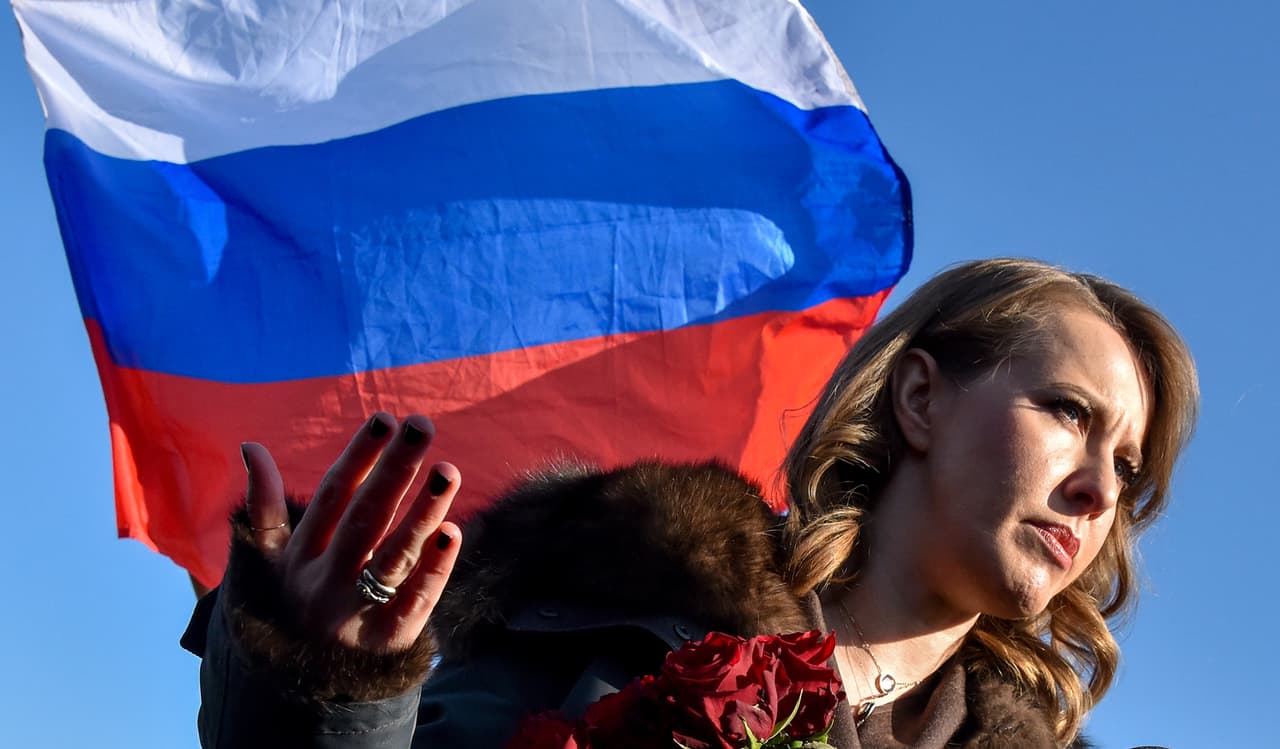 Russian presidential candidate Ksenia Sobchak speaks in central Moscow on February 27, 2018 at the site where late opposition leader Boris Nemtsov was fatally shot on a bridge near the Kremlin. A march in memory of Kremlin critic Boris Nemtsov gathered several thousand Muscovites on February 25, in a rare sanctioned opposition gathering ahead of next month's presidential vote. / AFP PHOTO / Vasily MAXIMOV (Photo credit should read VASILY MAXIMOV/AFP/Getty Images)