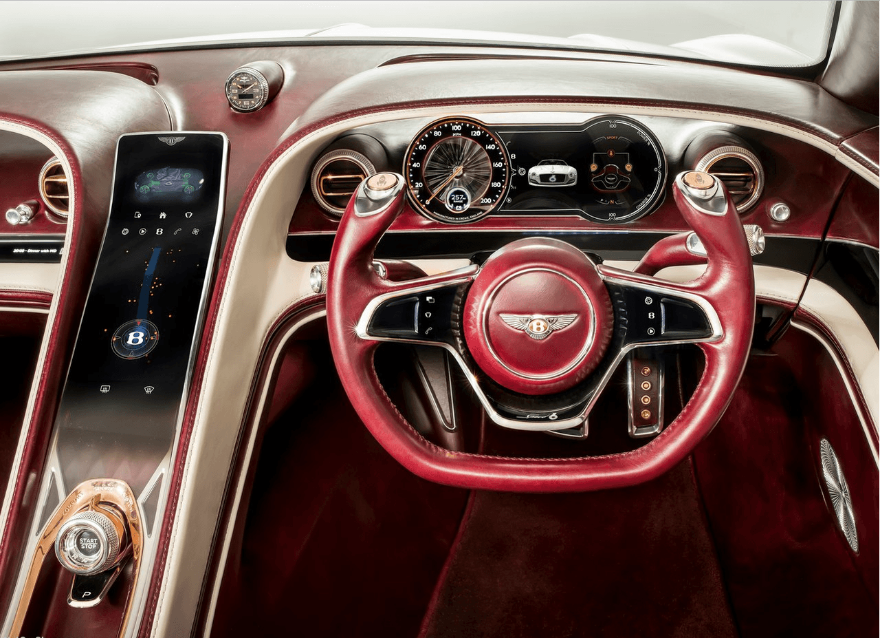 Si embargo lo tradicional termina con las formas del tablero ya que
<b>los instrumentos y controles del Bentley EXP 12 Speed 6e Concept son innovadores y futuristas</b> pero de una manera muy particular y casi retro cuando recordamos algunos excesos de los autos americanos más extremos de los años 50.