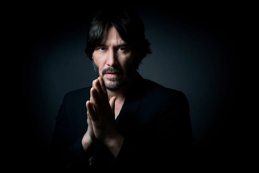 Canadian actor, producer, director and musician Keanu Reeves poses in Paris on April 12, 2016. (Photo by JOEL SAGET / AFP) (Photo credit should read JOEL SAGET/AFP via Getty Images)