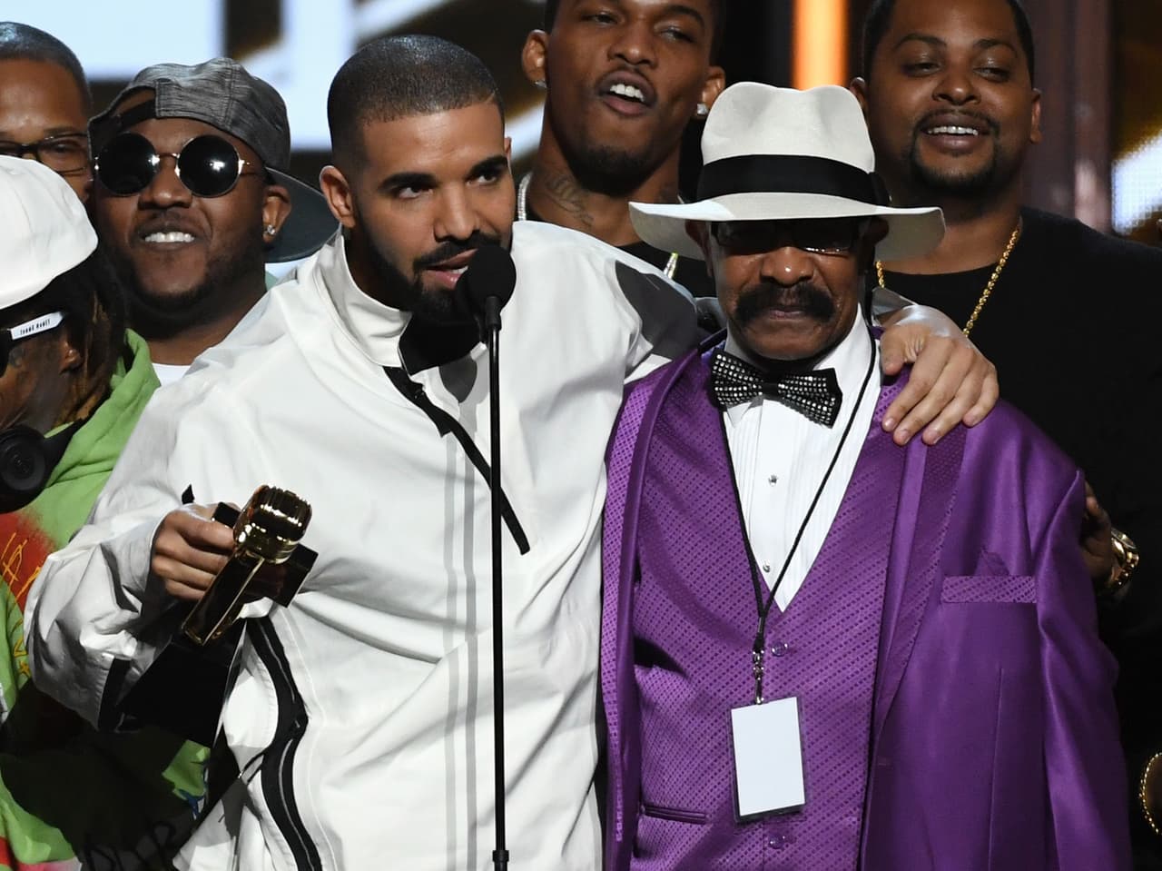 Drake's dad just got inked up with a portrait of son