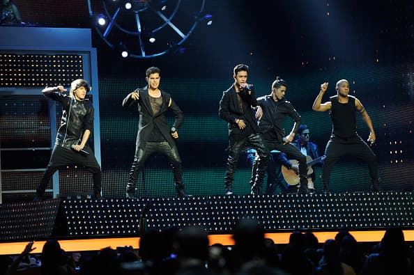 Latin Boy band
<b>CNCO</b> & Yandel (not pictured) perform onstage at the 2017 Billboard Latin Music Awards at Watsco Center in Coral Gables, Florida on April 27. The boy band just released a remix of their hit,
<i>'Reggaetón Lento' </i>with British girl group Little Mix.