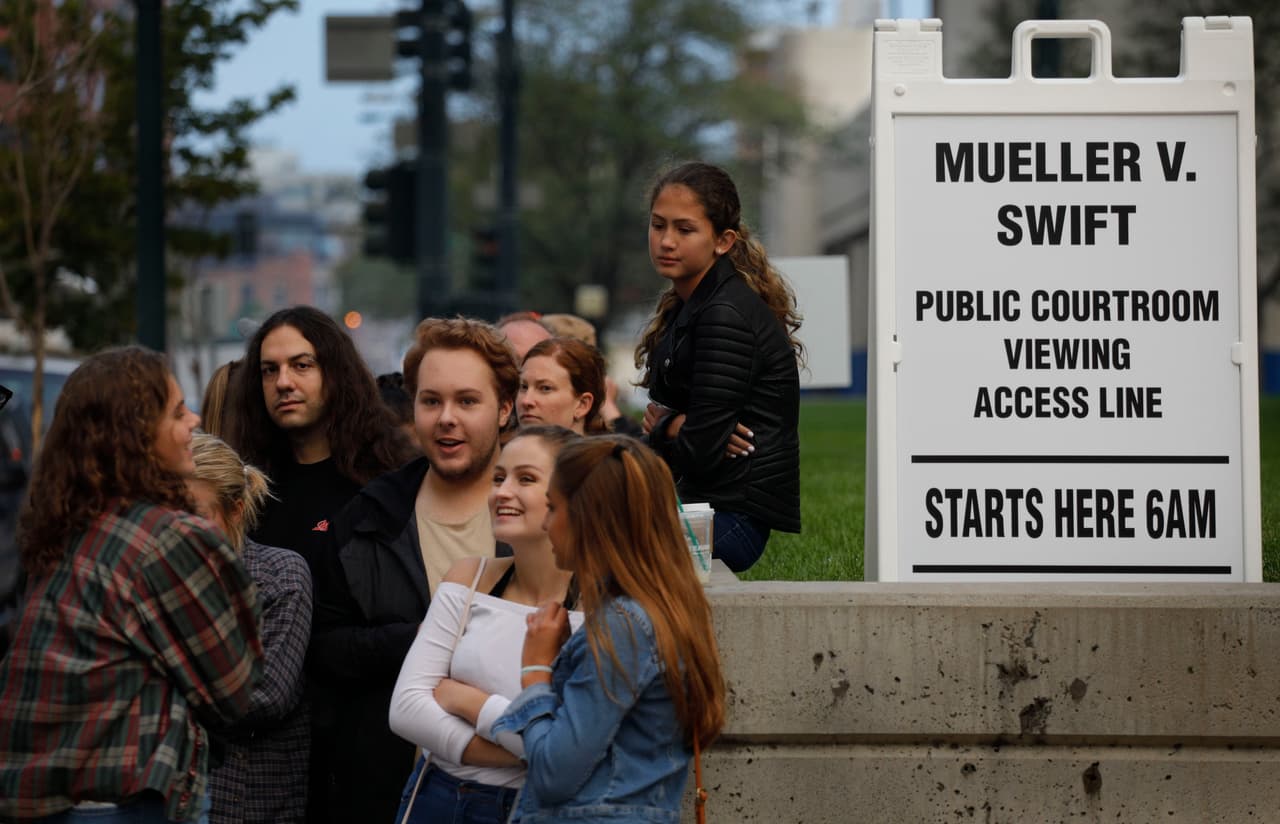 DENVER, CO - AUGUST 08: A group a about a dozen people wait in line to attend the civil case for Taylor Swift vs David Mueller at the Alfred A. Arraj Courthouse on August 8, 2017 in Denver, Colorado. Swift is suing David Mueller, a former DJ, for assault and battery after he allegedly groped her when they had a photo taken together June 2, 2013 at the Pepsi Center in Denver. Mueller is also suing Swift for supposedly pressuring his former employer, radio station KYGO, to fire him following the incident. (Photo by Joe Mahoney/Getty Images)