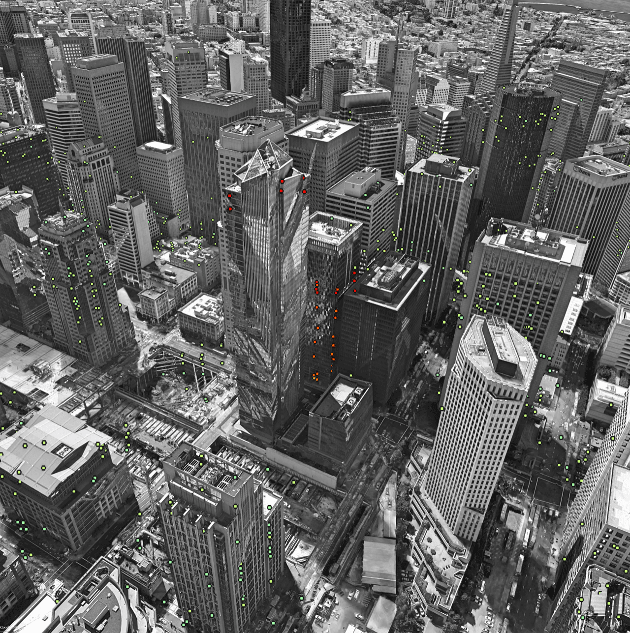 La Torre Millennium, al centro de la fotografía, con puntos rojos de hundimiento.