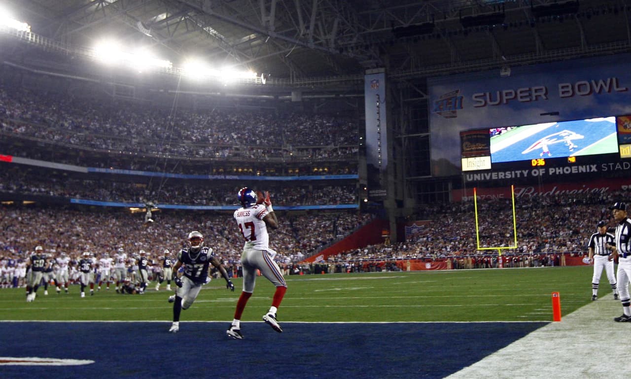 El partido se definió con pase de touchdown de Eli Manning a Plaxico Burress para marcador final de 17 - 14, tercer título de Super Bowl para los New York Giants.