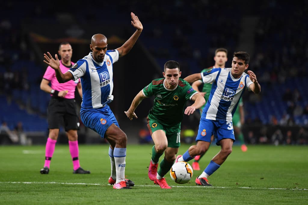 BARCELONA, SPAIN - FEBRUARY 27: Daniel Podence of Wolverhampton Wanderers battles for possession with Naldo of RCD Espanyol during the UEFA Europa League round of 32 second leg match between Espanyol Barcelona and Wolverhampton Wanderers at Power8 Stadium on February 27, 2020 in Barcelona, Spain. (Photo by David Ramos/Getty Images)