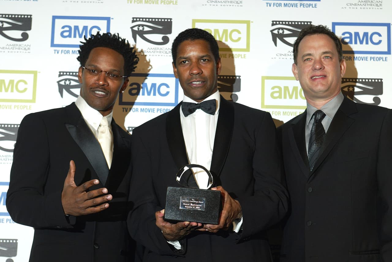 Jamie Foxx, Denzel Washington y Tom Hanks en 2002