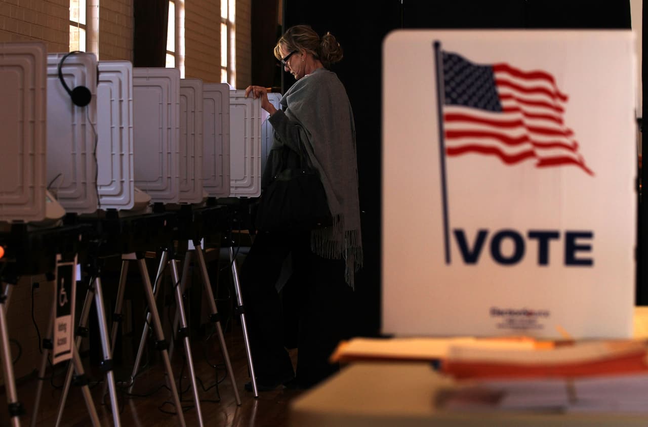 SANDY SPRINGS, GA - MARCH 06: Local resident Teri Rogers casts her vote at a polling station in St Andrew Presbyterian Church March 6, 2012 in Sandy Springs, Georgia. Ten states, including Georgia, hold caucuses and primaries today for voters to pick their choices for the Republican presidential nominee. (Photo by Alex Wong/Getty Images)