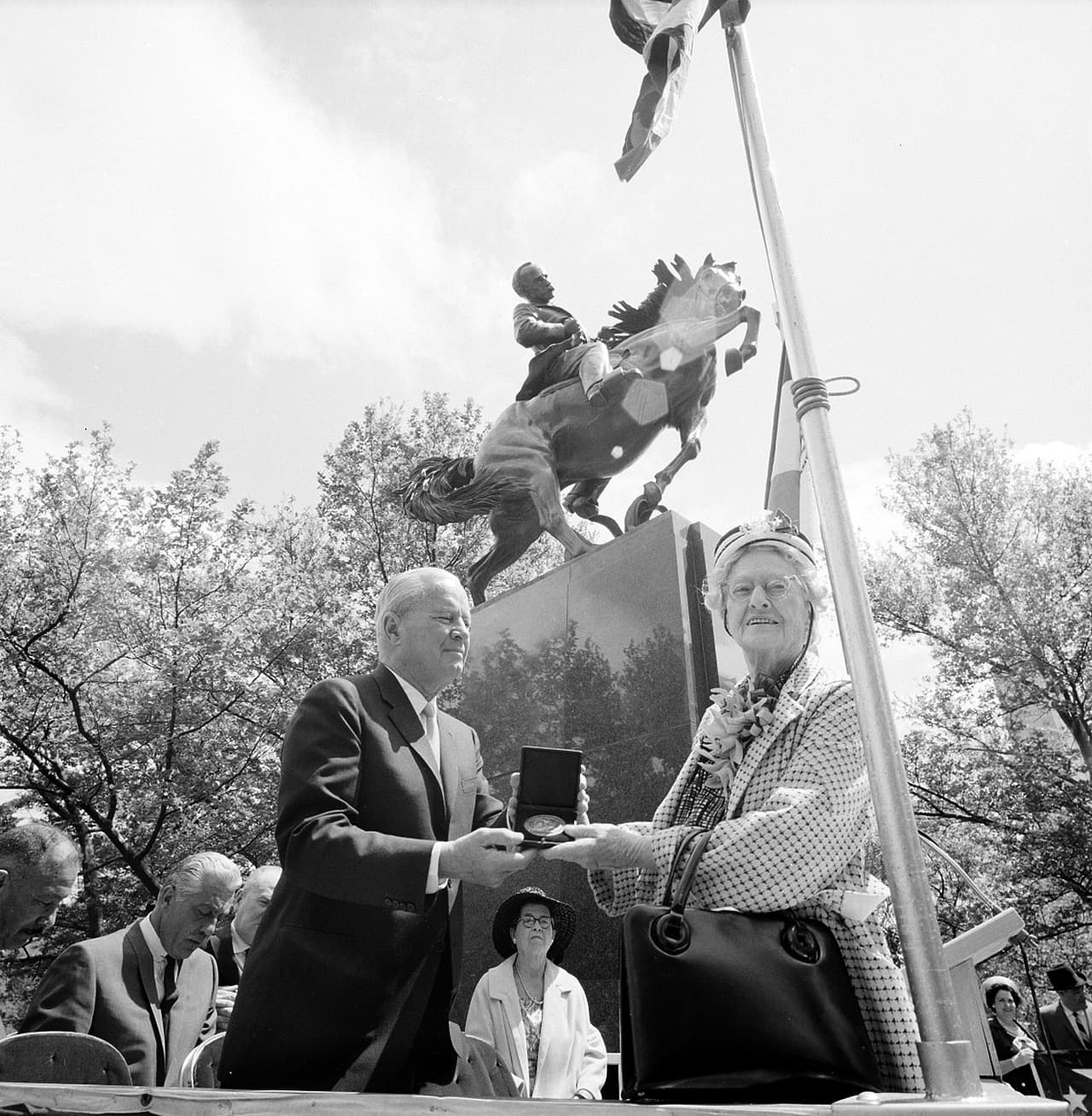 The original statue, sculpted by U.S. artist Anna Hyatt Huntington, stands at the south entrance to New York City’s Central Park on the Avenue of Americas. It was unveiled May 18 1965. In this photo the sculptor receives the city medallion from Richard C. Patterson Jr., commissioner of public events for New York City. (AP Photo)
<br>