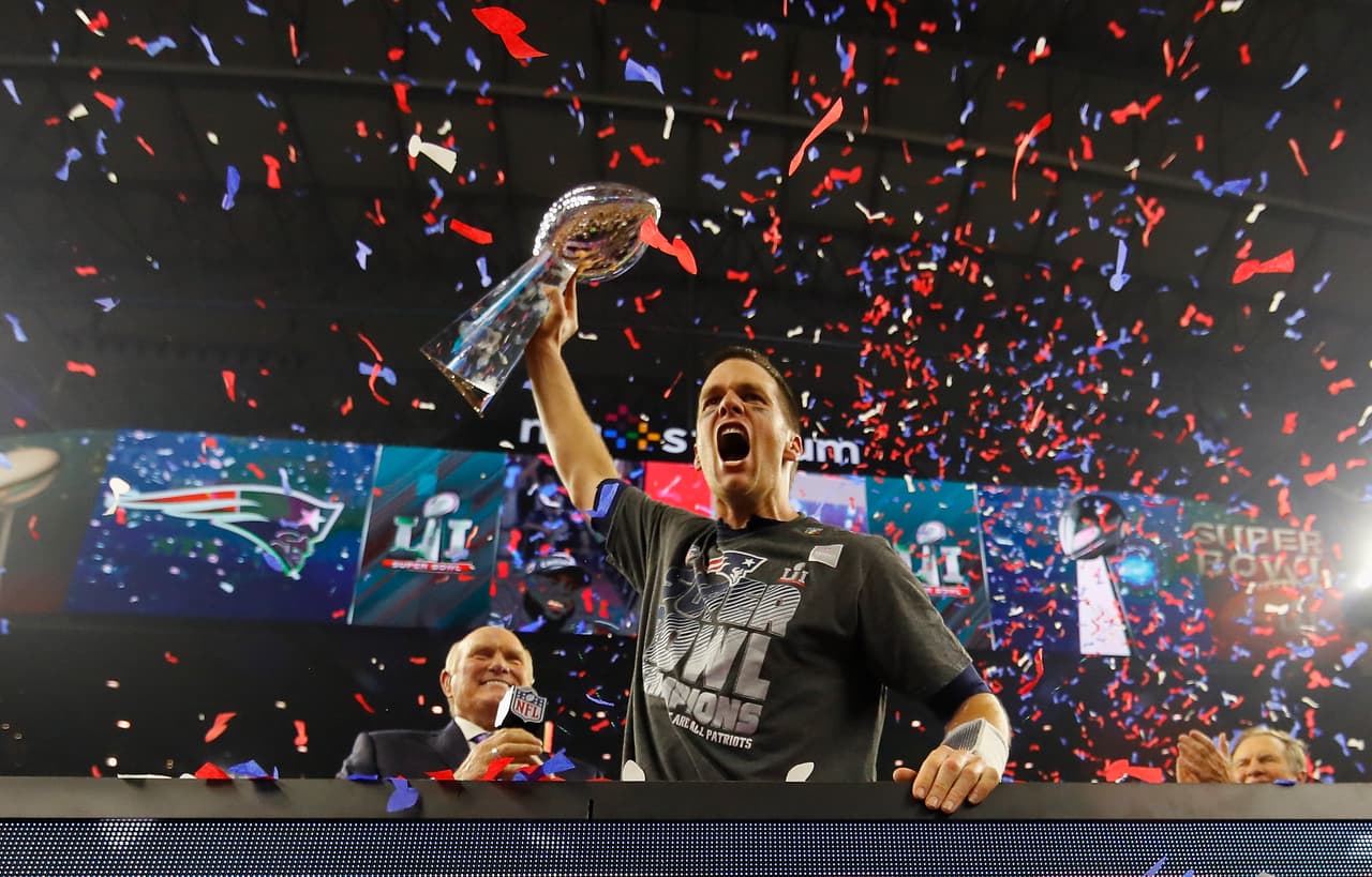 HOUSTON, TX - FEBRUARY 05: Tom Brady #12 of the New England Patriots raises the Vince Lombardi Trophy after defeating the Atlanta Falcons during Super Bowl 51 at NRG Stadium on February 5, 2017 in Houston, Texas. The Patriots defeated the Falcons 34-28. (Photo by Kevin C. Cox/Getty Images)