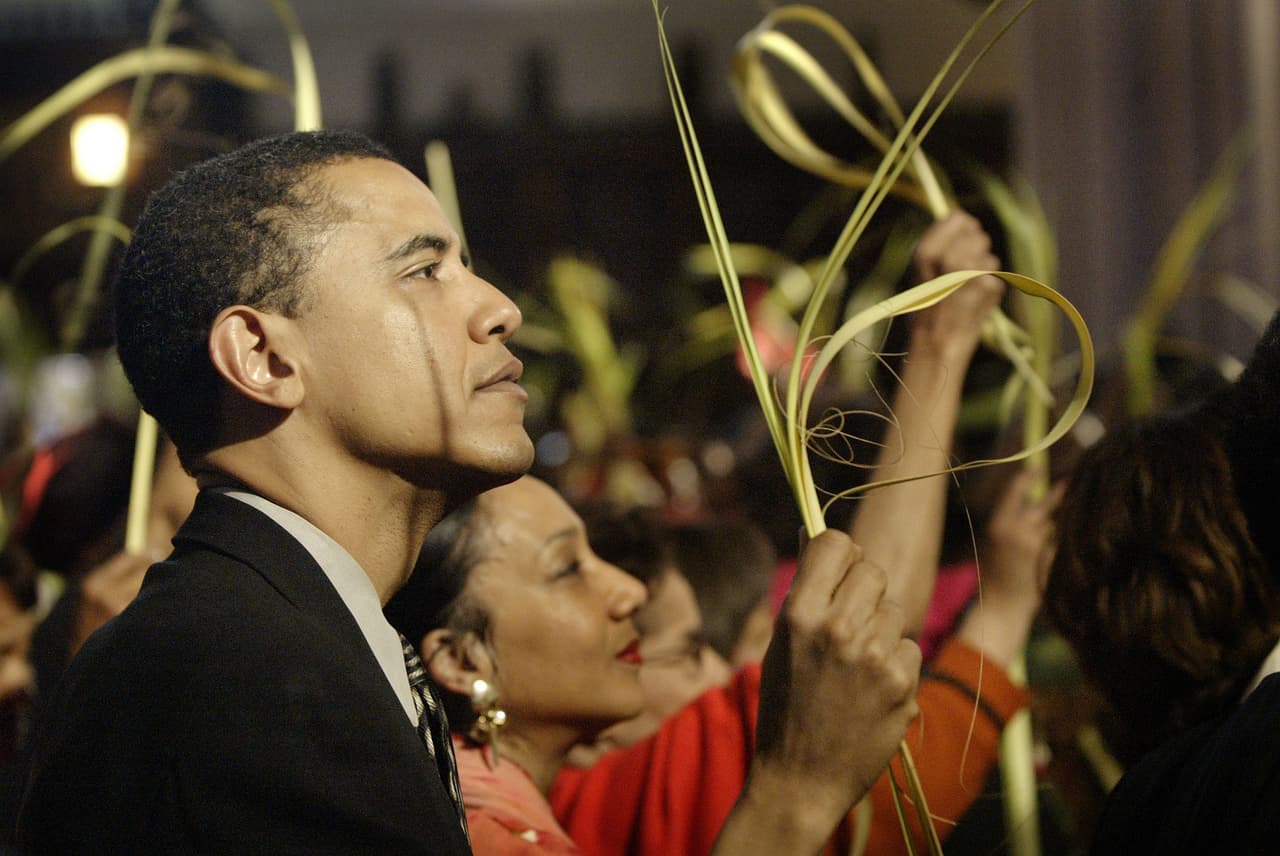 El entonces candidato al senado Barack Obama durante una misa del Domingo de Ramos en 2004.