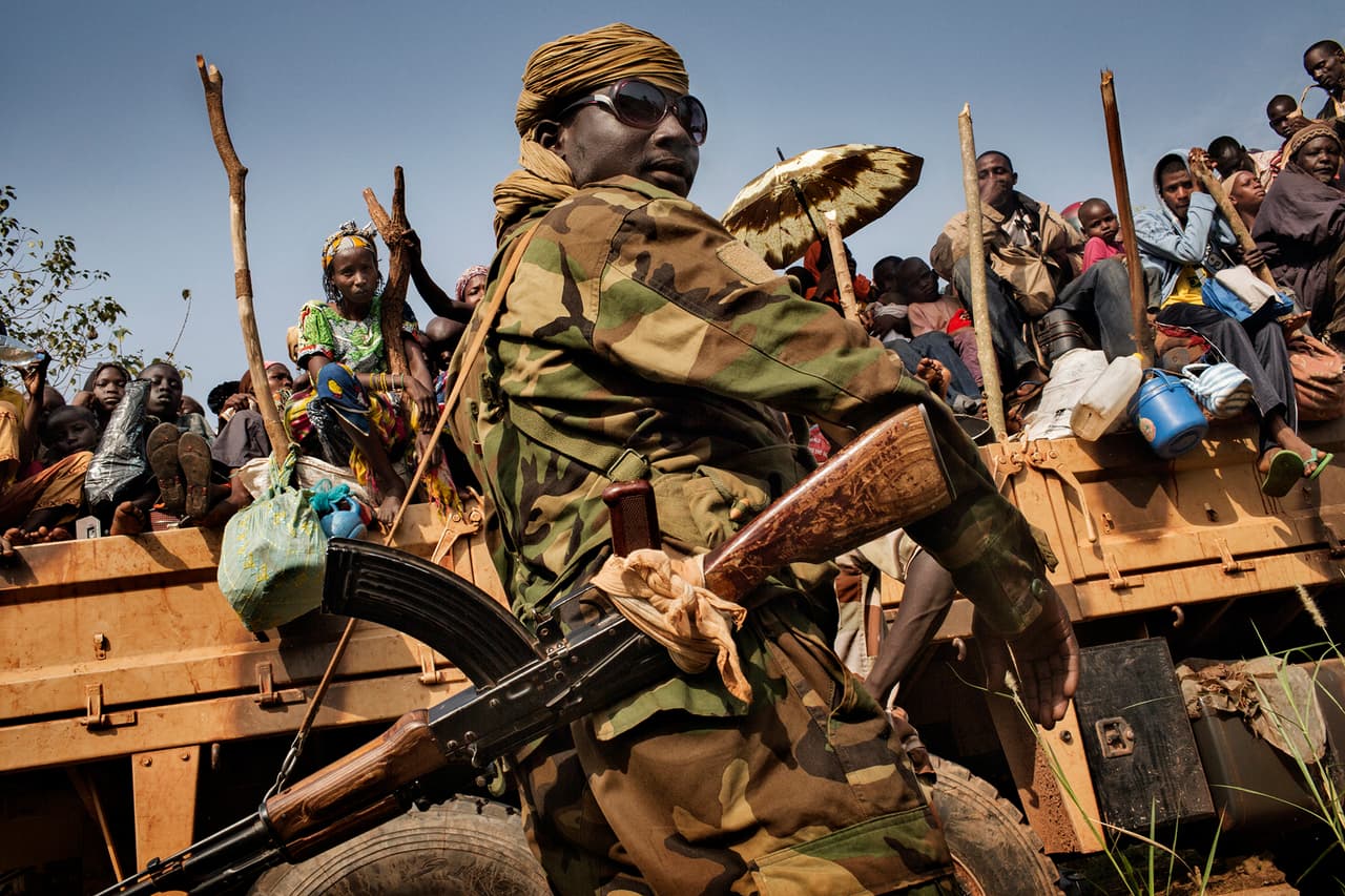 Muslims flee the town of Bangui aided by Chadian special forces.