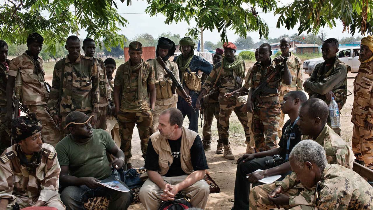 Human Rights Watch's emergencies director Peter Bouckaert (center) meets with Colonel Saleh Zabadani (far left) and General Mahamat Bahar (second from the left) of the Seleka forces in Bossangoa.
