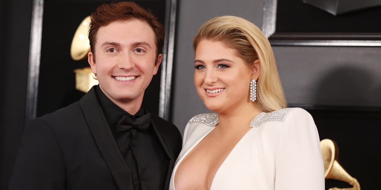 61st Grammy Awards - Arrivals - Los Angeles, California, U.S., February 10, 2019 - Daryl Sabara and Meghan Trainor. REUTERS/Lucy Nicholson