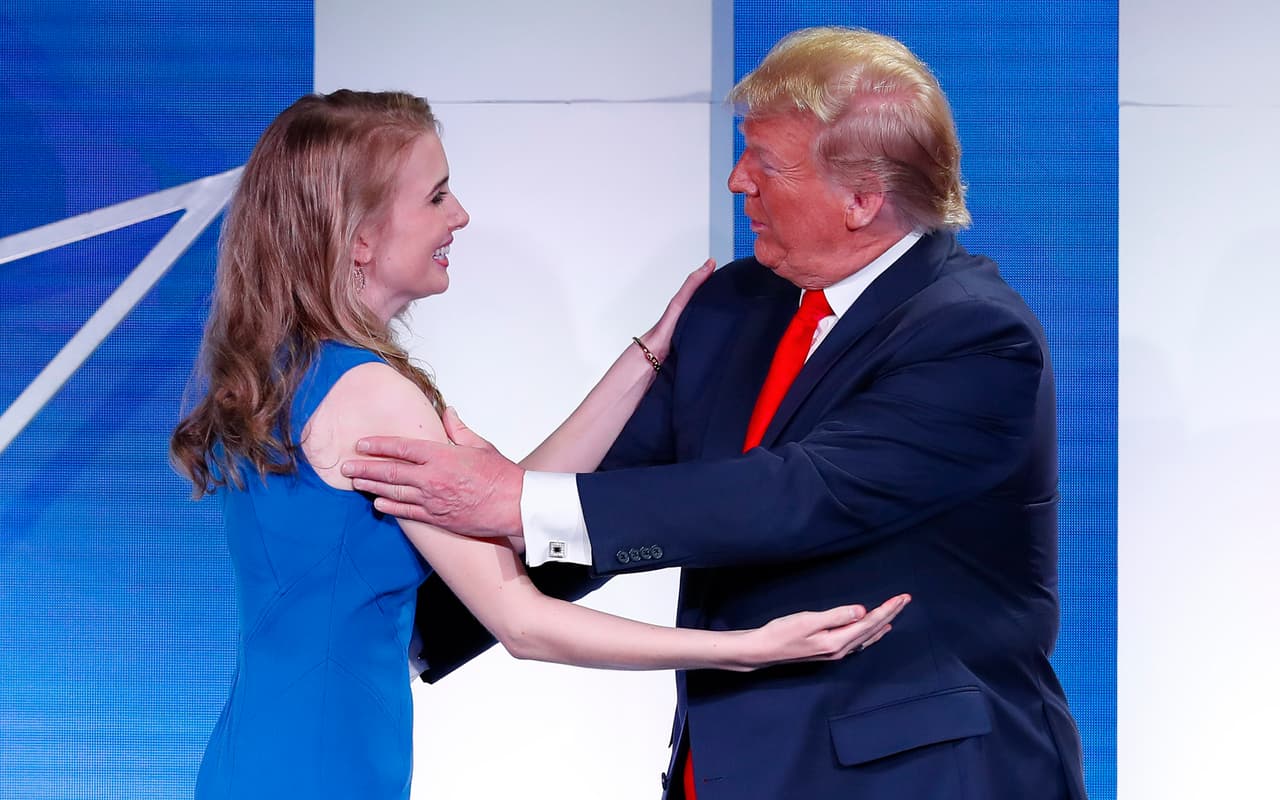 President Donald Trump, right, greets Natalie Harp, left, and invites her to speaks at the Faith & Freedom Coalition conference in Washington, Wednesday, June 26, 2019. (AP Photo/Pablo Martinez Monsivais)