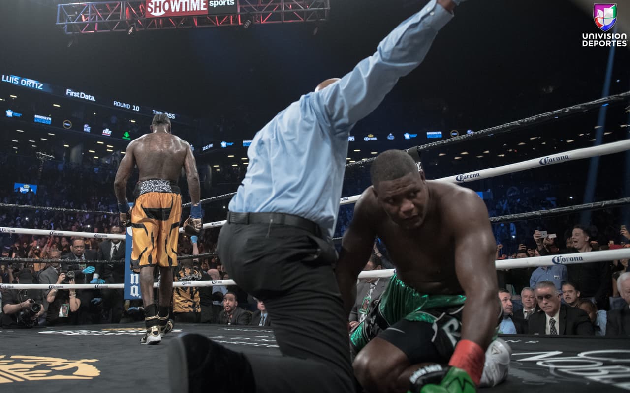 La pelea estelar en el Barclays Center de Brooklyn, una de las más esperadas en la categoría de los pesos completos, sobrepasó las expectativas de los aficionados. Luis Ortiz (28-1, 24 KOs) le complció la noche a Deontay Wilder (40-0, 39 KOs), pero el campeón sacó a relucir en el décimo round el poder que tiene en los nudillos para mandar al cubano a la lona en dos ocasiones y sellar la victoria.