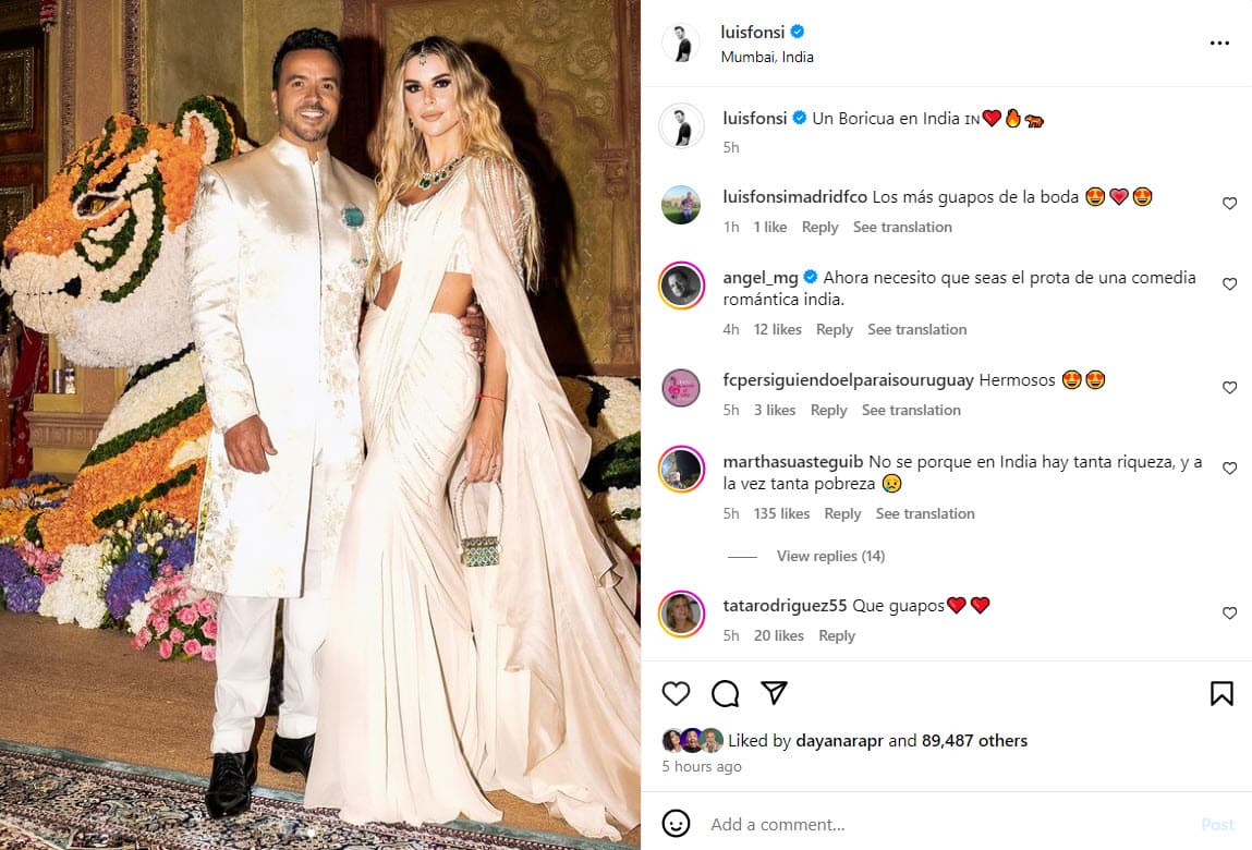 Luis Fonsi y su esposa en la boda de Anant Ambani.