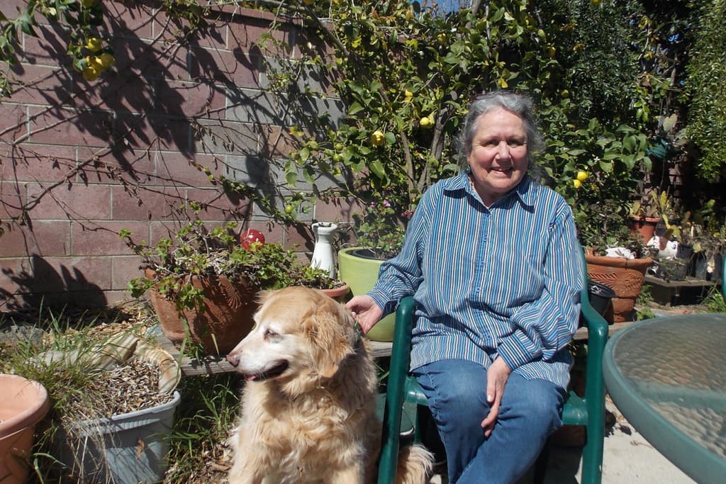 Inez Shakman lives in Ventura, Calif., and was recently diagnosed with chronic obstructive pulmonary disease, or COPD. She walks her dog, Joy, when she can but gets winded easily. (Anna Gorman/KHN)