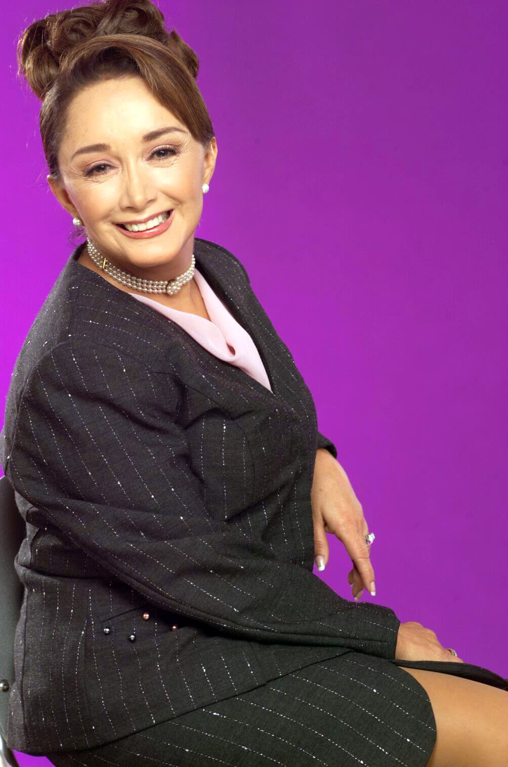 El color del bañador era azul con un diseño muy al estilo de los que se usaban en la década de 1950.
<br>