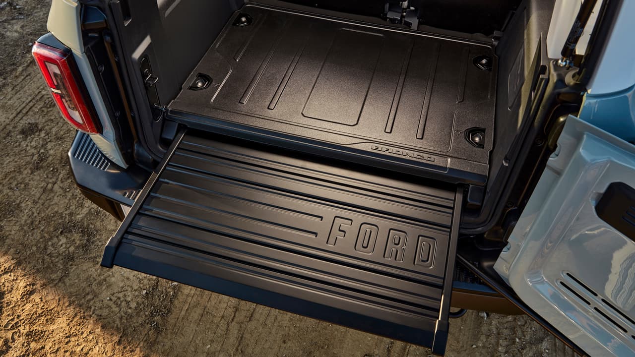 A slide-out rear tailgate provides greater convenience for two- and four-door Bronco models. (Prototype not representative of production vehicle.)