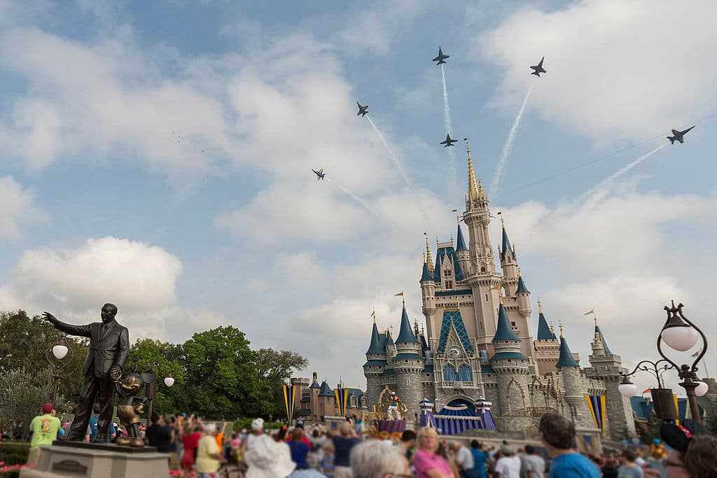 LAKE BUENA VISTA, FL - MARCH 19: In this handout photo provided by Disney Parks, in a special moment for Magic Kingdom guests, the U.S. Navy Flight Demonstration Squadron, the Blue Angels, streaked across the skies above, Cinderella Castle March 19, 2015 at Walt Disney World Resort in Lake Buena Vista, Florida. The flyover featured the Blue Angels' six-jet F/A-18 Hornet Delta Formation making two dramatic passes above the Magic Kingdom, with Cinderella Castle as a focal point, en route to an air show in Florida. (Photo by Mariah Wild/Disney Parks via Getty Images)