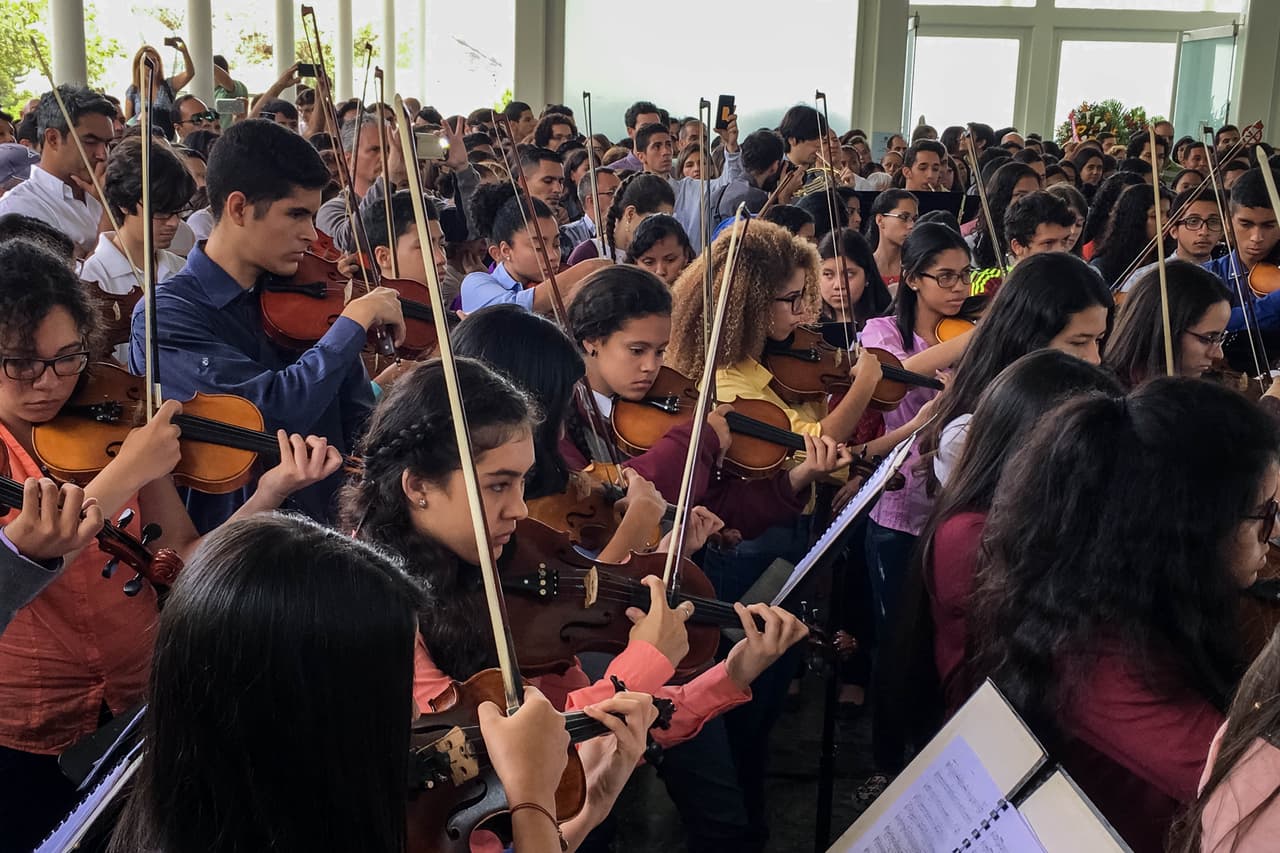Members of Venezuela's famous music education program, 'El Sistema,' perform at the funeral of Armando Cañizales, a musician killed Wednesday in a clash between demonstrators and members of the Bolivarian National Guard in Caracas. May 4, 2017.