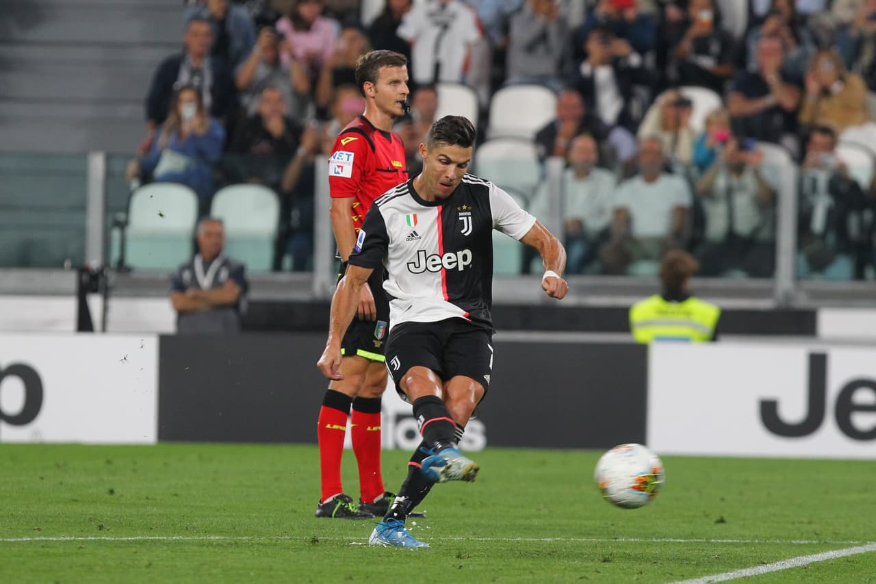 Cristiano Ronaldo (Juventus FC) kick the penalty that will give Juventus the victory during the Serie A football match between Juventus FC and Hellas Verona FC at Allianz Stadium on September 21, 2019 in Turin, Italy. Juventus won 2-1 over Verona. (Photo by Massimiliano Ferraro/NurPhoto via Getty Images)