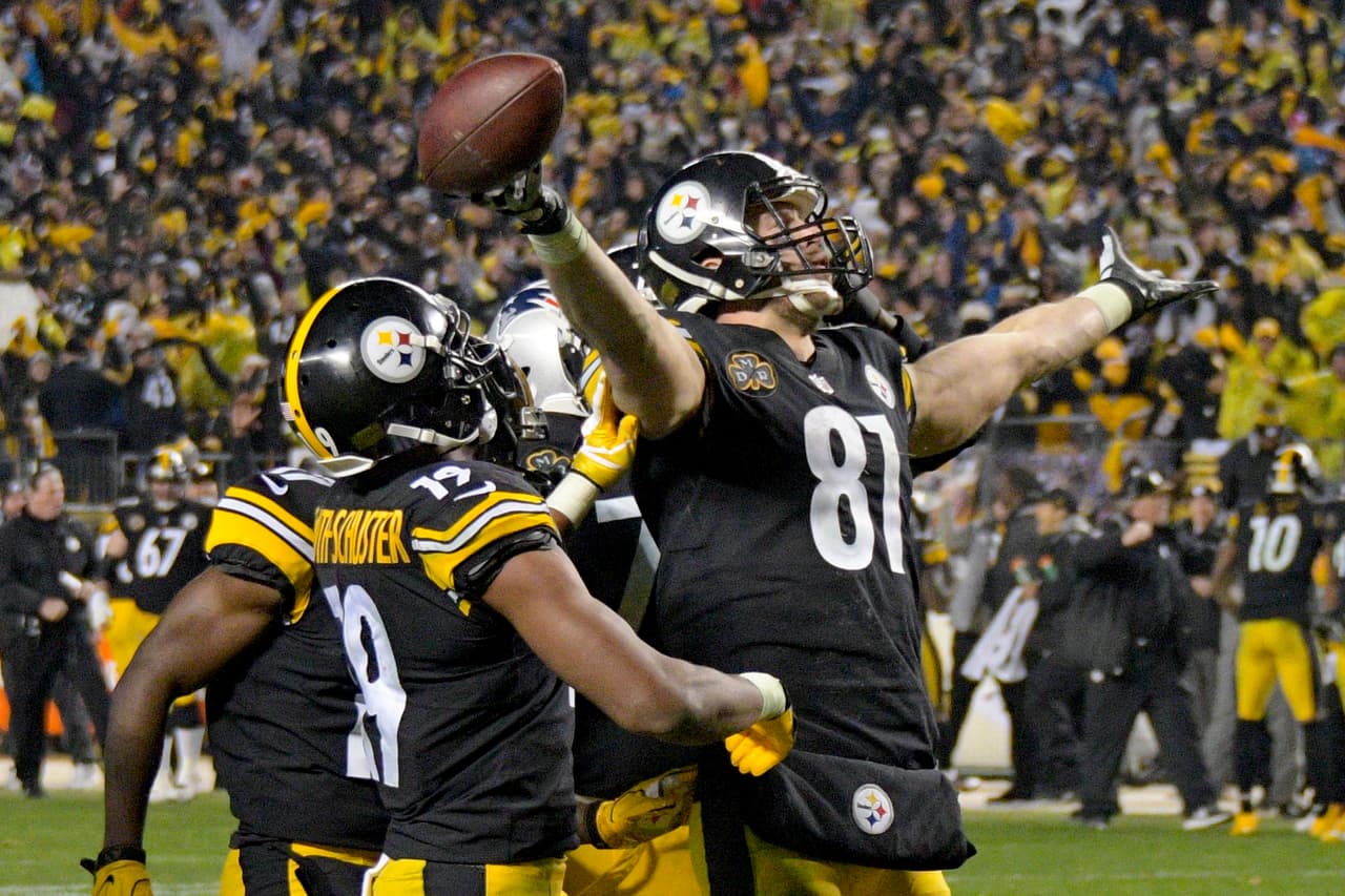 Pittsburgh Steelers tight end Jesse James (81) celbrates after he thought he caught a pass for a touchdown against the New England Patriots with seconds remaining in the fourth quarter of an NFL football game in Pittsburgh, Sunday, Dec. 17, 2017. Upon video review, the touchdown call was reversed and the pass was ruled incomplete. The Patriots held on to win 27-24. (AP Photo/Don Wright)