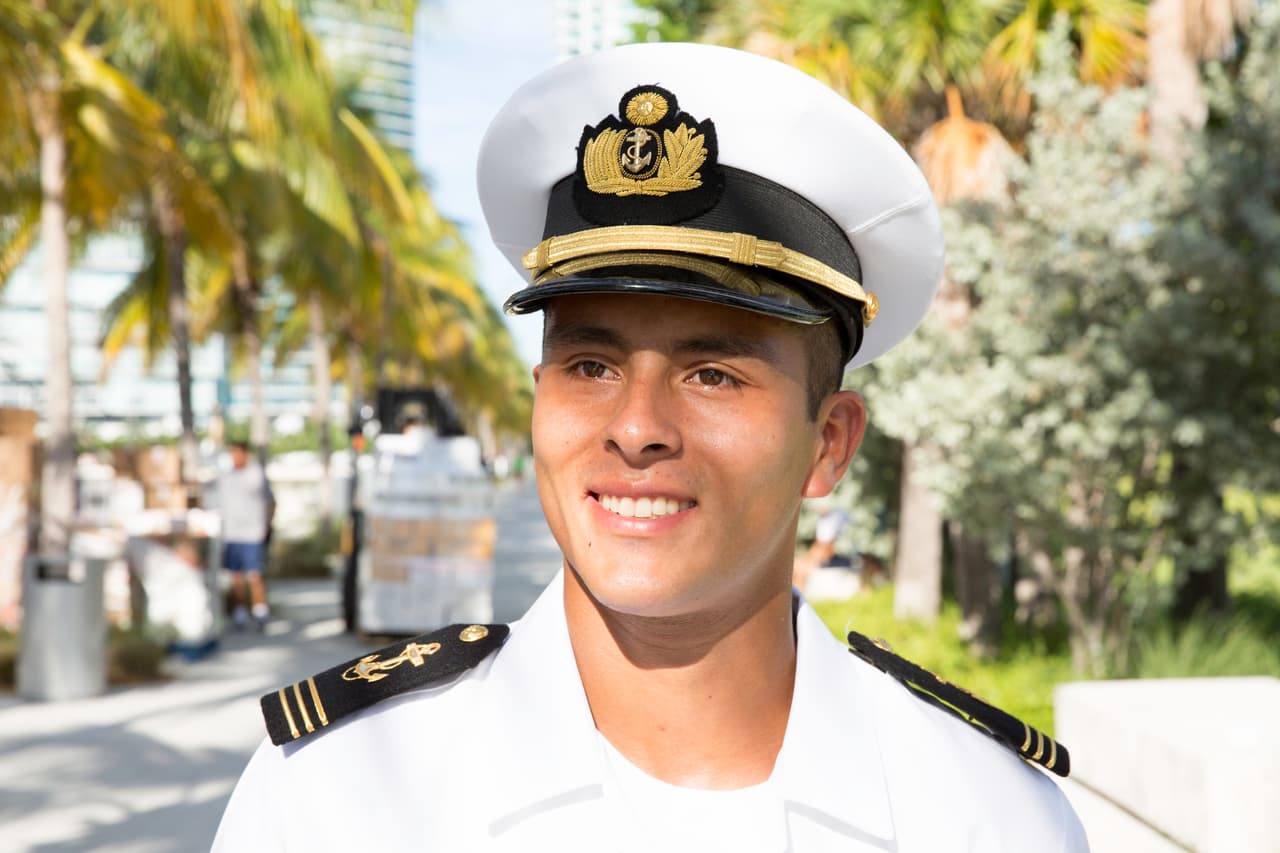 As Manlio guides a group of tourists through the ship, he shares a tender moment with his mother, who grabs his hand lovingly and tries to wipe off two smudges of white paint. He explains: “We spent the whole day painting the ship yesterday to make sure it was all pretty.”