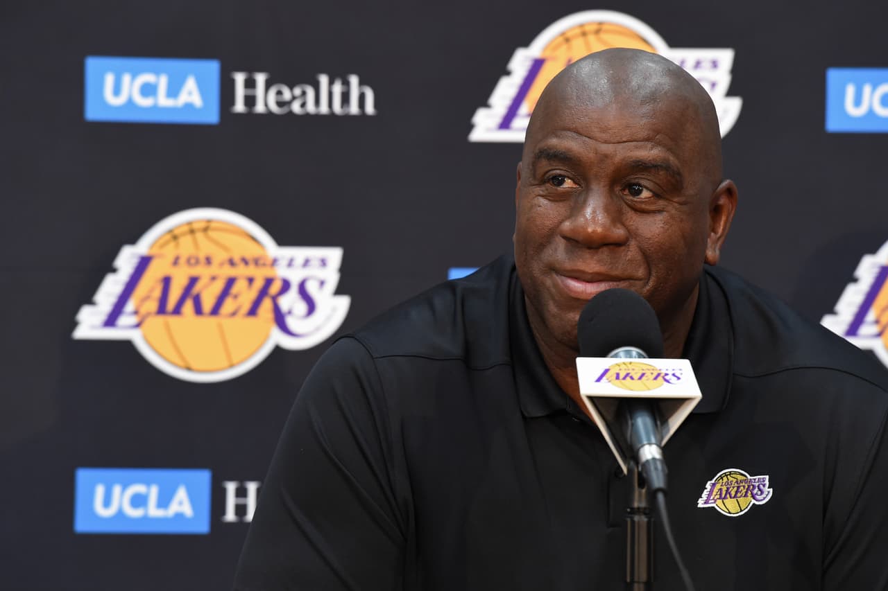 EL SEGUNDO, CA - SEPTEMBER 20: Lakers President of Basketball Operations Earvin "Magic" Johnson and General Manager Rob Pelinka conduct a press conference at the Lakers UCLA Health Training Facility in El Segundo, California. NOTE TO USER: User expressly acknowledges and agrees that, by downloading and or using this photograph, User is consenting to the terms and conditions of the Getty Images License Agreement. Mandatory Copyright Notice: Copyright 2018 NBAE (Photo by Andrew D. Bernstein/NBAE via Getty Images)