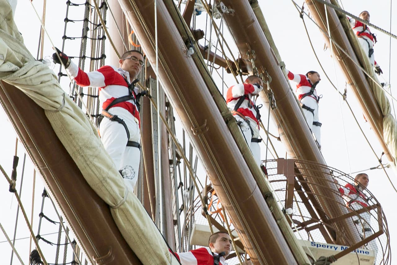 From shore, Polo Smith sees Manlio (third from the left, in the middle), who is rubbing his eyes with a tissue. "He’s crying, too,” Polo Smith says, in tears.
<br>