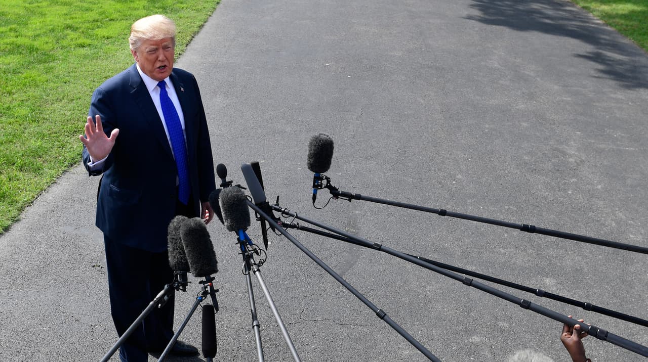 President Donald Trump talks with reporters on the South Lawn of the White House in Washington, Tuesday, Oct. 2, 2018, as he heads to Pennsylvania. (AP Photo/Susan Walsh)