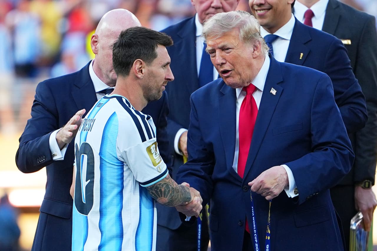 President Donald J. Trump give Argentina's Lionel Messi (10) his runner-up metal during the World Cup final soccer match between Spain and Argentina in East Rutherford, N.J., near New York, Sunday, July 19, 2026. (AP Photo/Julio Cortez)