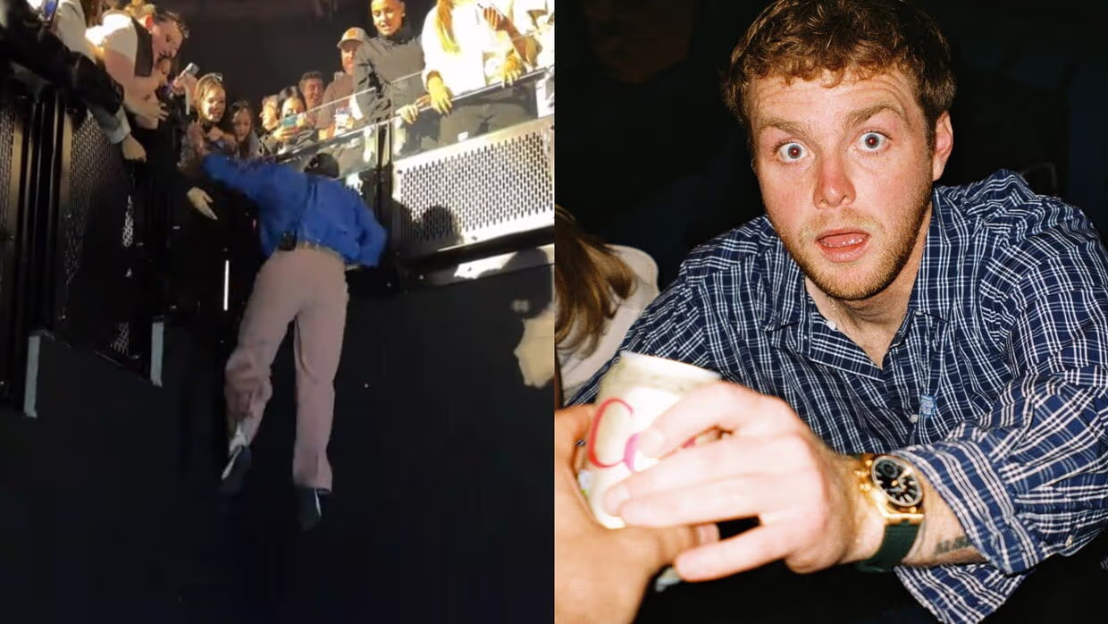 Cantante Alex Warren sufre aparatosa caída tras lanzarse desde una grada