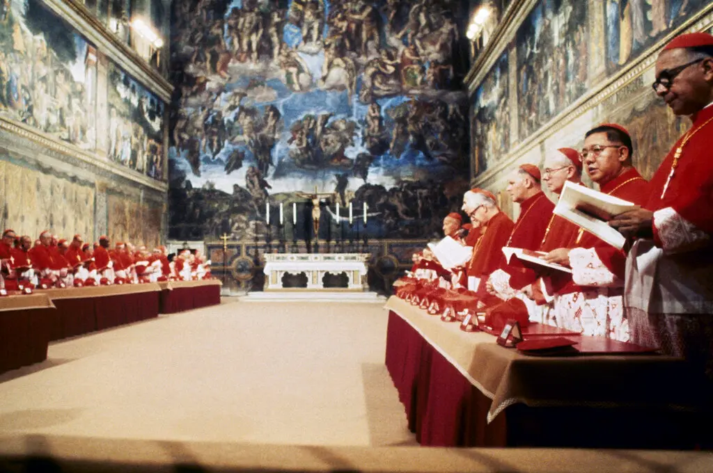Pictured here cardinals enter the Sistine chapel in Vatican City on Oct. 14, 1978, to elect a new pope following the death of Pope John Paul I. (AP Photo)